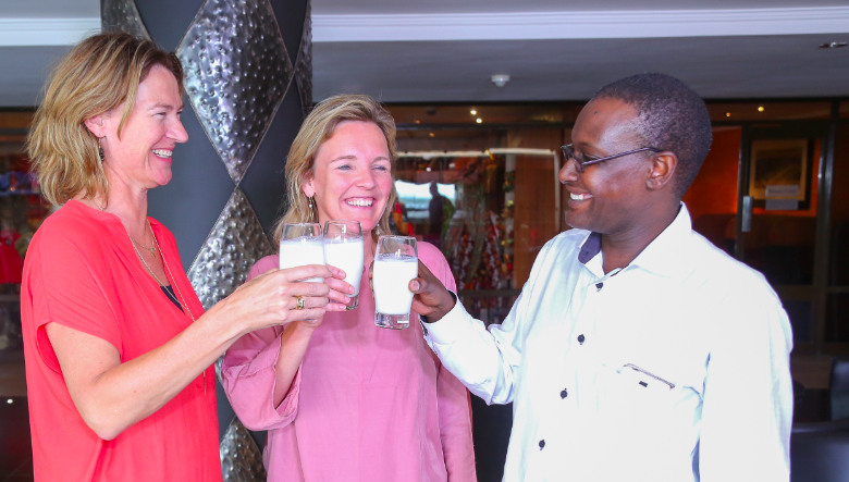 DOB Equity Chief Executive Officer, Brigit van Dijk-van de Reijt (left) flanked by the firm’s Investment Manager, Saskia van der Mast (centre) join Countryside Dairy Managing Director, George Mwangi (right) in a symbolic toast to celebrate DOB Equity’s investment in the Kenyan dairy firm