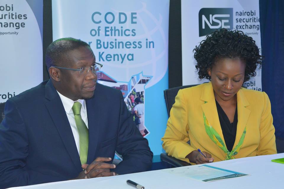 Global Compact Network Kenya representative CEO Phyllis Wakiaga with Nairobi Securities Exchange CEO Geoffrey Odundo during the signing of the Code of Ethics for Business at the NSE offices on May 30, 2016