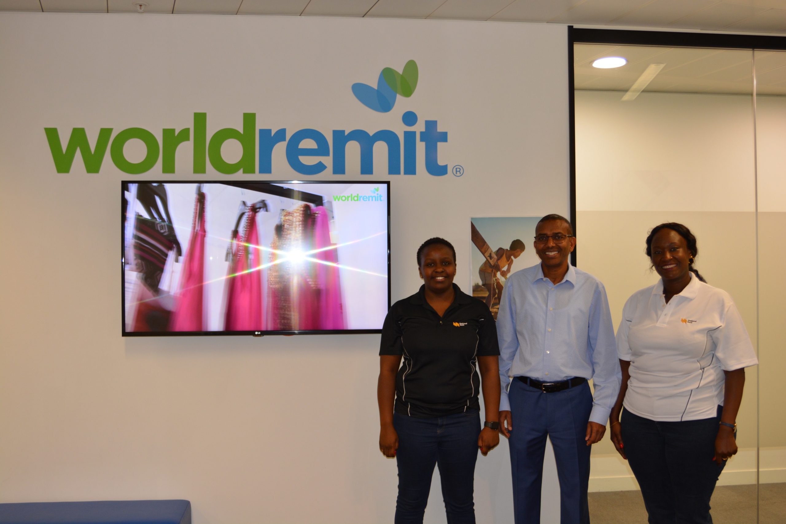 National Bank Head of Premium Banking, Ms. Alice Kimuhu (R) and Manager, Diaspora Banking, Ms. Caroline Mugo (L) with World Remit’s Founder and CEO, Mr. Ismail Ahmed (C) at the World Remit Headquarters in London