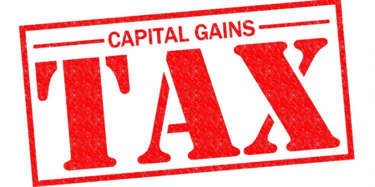 CAPITAL GAINS TAX red Rubber Stamp over a white background.
