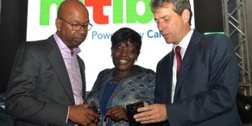From left  to right: Bob Collymore, Safaricom CEO, Millicent Olulo, Country Director PharmAccess and  Michiel Slootweg, CarePay CEO