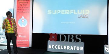 Kotin makes a presentation about SuperFluid Labs at the Hong Kong-based DBS Accelerator's Demo Day in 2015. (Photo provided by Timothy Kotin.)