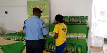 A police man is well attended to by a Jambo Chai Member, a product by APT Commodities which joined the NSE's Ibuka program