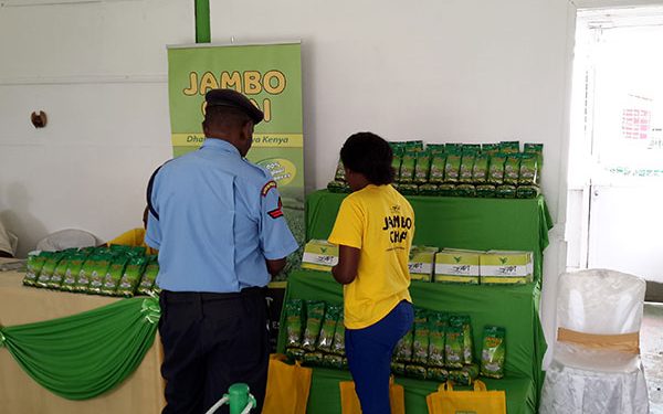 A police man is well attended to by a Jambo Chai Member, a product by APT Commodities which joined the NSE's Ibuka program