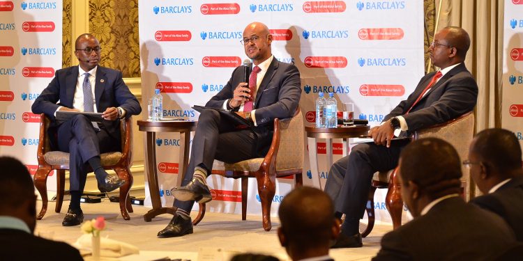 Absa Bank Kenya Executives from left to right, Chief Strategy Officer Moses Muthui, CEO and MD Jeremy Awori (Center ) and CFO Yusuf Omari