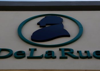 FILE PHOTO: The corporate logo of De La Rue is seen at De La Rue Malta at Bulebel Industrial Estate in Zejtun, Malta April 24, 2018. REUTERS/Darrin Zammit Lupi/File Photo