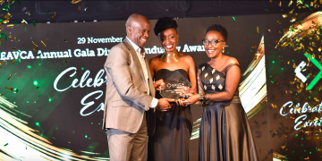 Ayisi Makatiani (Managing Partner, Fanisi Capital) receives the Special Recognition award from the EAVCA team at the 2019 Annual EAVCA Awards in Nairobi