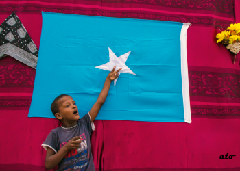 Image of a child with the Somalia Flag