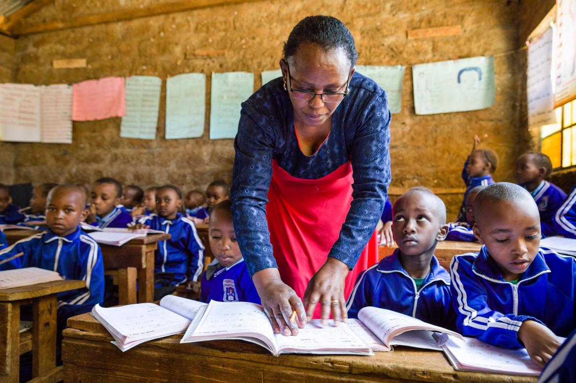 A Teacher And Her Students In Class Kenya Kenyan Wallstreet