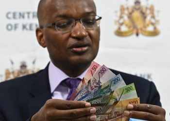 Dr Patrick Njoroge CBK Governor Displaying some of the new curreny Notes