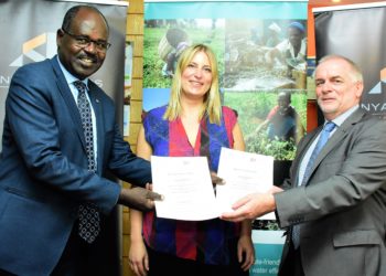 Ms. Lucie Pulschke, GIZ, Water and Energy for Food (WE4F) East Africa Hub Manager (Centre) Mr. Armin Kloeckner, GIZ, Head of the Agriculture Programme (Far Right) and Kenya Bankers Association (KBA) CEO Dr. Habil Olaka during the signing of the Agreement.