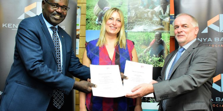 Ms. Lucie Pulschke, GIZ, Water and Energy for Food (WE4F) East Africa Hub Manager (Centre) Mr. Armin Kloeckner, GIZ, Head of the Agriculture Programme (Far Right) and Kenya Bankers Association (KBA) CEO Dr. Habil Olaka during the signing of the Agreement.