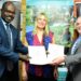 Ms. Lucie Pulschke, GIZ, Water and Energy for Food (WE4F) East Africa Hub Manager (Centre) Mr. Armin Kloeckner, GIZ, Head of the Agriculture Programme (Far Right) and Kenya Bankers Association (KBA) CEO Dr. Habil Olaka during the signing of the Agreement.