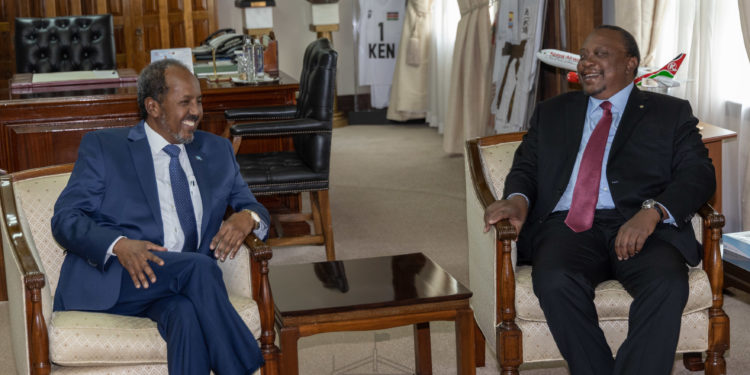 Kenya President Uhuru Kenyatta with Somalia President Hassan Sheikh Mohamud