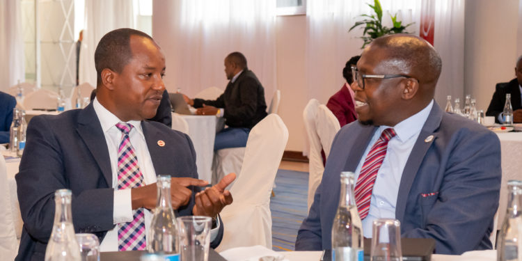 Interim Absa Bank CEO Yusuf Omari (left) discusses alongside NSE CEO Geoffrey Odundo during a deep dive session of the African Financial Markets Index (AFMI) 2022