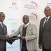 Mi Vida Homes CEO Samuel Kariuki (L), IHS Kenya co-MDs Peter Mayavi and Kioi Wambaa (R) sign an agreement for delivering affordable housing in Kenya.