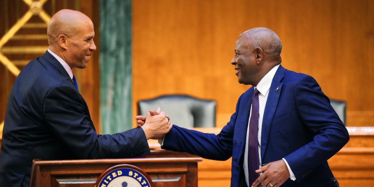 L-R: Senator Cory Booker (D-NJ) shakes hands with Dr. James Mwangi, Equity Group CEO. Senator Booker spoke about the importance of strengthening partnerships with Kenya.