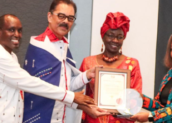 Jubilee Health Insurance CEO, Njeri Jomo (far right), receives the prestigious CEO of the Year Award during the 2024 Company of the Year Awards (COYA),